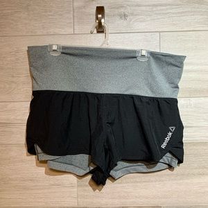 3/$30 Reebok play dry running shorts black and grey size Large 2 in 1